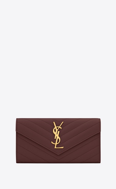 Monogram large flap wallet in grain de poudre embossed leather